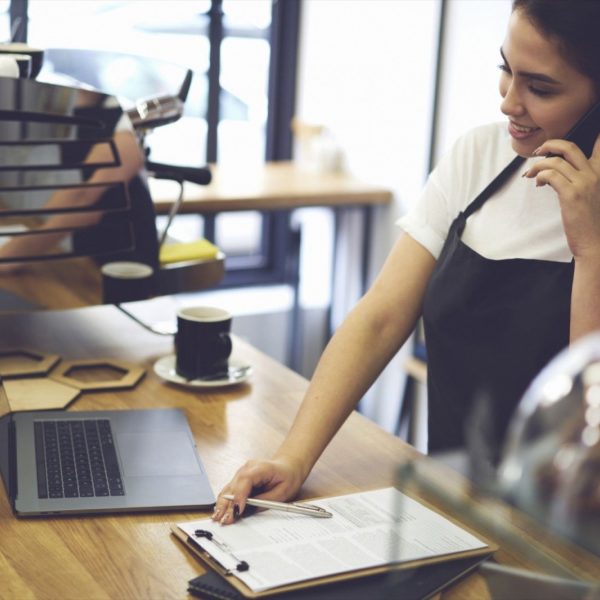 girl-on-the-telephone-for-customer-service waitress on telephone for customer service
